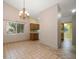 Dining room with tile flooring and a decorative chandelier at 3687 Imperial Ridge Pkwy, Palm Harbor, FL 34684