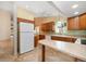 Bright eat in kitchen with updated appliances and counter seating at 3687 Imperial Ridge Pkwy, Palm Harbor, FL 34684