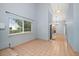 Bright and airy living room with tile flooring and ample space, perfect for entertaining guests or relaxing at 3687 Imperial Ridge Pkwy, Palm Harbor, FL 34684