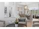 Cozy living area with dining area and pool views, perfect for entertaining guests at 3707 Smoke Hickory Ln, Valrico, FL 33596