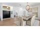 Elegant dining room with a modern chandelier and views of the front yard at 3707 Smoke Hickory Ln, Valrico, FL 33596
