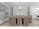 Dining area featuring a modern chandelier, neutral color palette, and lots of light at 3707 Smoke Hickory Ln, Valrico, FL 33596