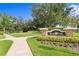 Welcome to River Hills Country Club, a beautiful community with lush landscaping and a welcoming entrance at 3707 Smoke Hickory Ln, Valrico, FL 33596
