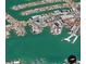 An aerial view of the condo complex with surrounding canals and waterfront properties in Clearwater, Florida at 400 Island Way # 1606, Clearwater Beach, FL 33767