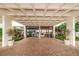 Lobby with a patterned ceiling, brick flooring, and manicured landscaping that enhances the entrance at 400 Island Way # 1606, Clearwater Beach, FL 33767