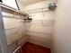 Spacious walk-in closet featuring multiple levels of wire shelving at 4215 E Bay Dr # 1707C, Clearwater, FL 33764