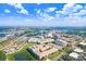 Expansive aerial view showcasing the vibrant city skyline and lush green landscape under a bright blue sky at 4221 W Spruce St # 1429, Tampa, FL 33607