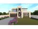 Modern two-story home boasts a clean design, balcony, and a two-car garage, complemented by a well-manicured lawn at 4316 Wallace Cir, Tampa, FL 33611