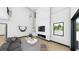 Bright living room features a modern fireplace with a white marble surround, lots of windows and open floor plan at 4316 Wallace Cir, Tampa, FL 33611