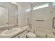 Bathroom with grab bars for accessibility and neutral colors at 502 Arch Ridge Loop, Seffner, FL 33584