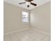 Bedroom with a ceiling fan and a window at 502 Arch Ridge Loop, Seffner, FL 33584