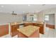 Open kitchen featuring granite countertops, stainless steel appliances, and a kitchen island at 502 Arch Ridge Loop, Seffner, FL 33584