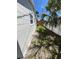 Narrow side yard with wooden fence, offering privacy at 6081 22Nd N Ave, St Petersburg, FL 33710
