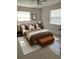 Cozy staged bedroom with a plush bed, complementary decor, and ample natural light at 6081 22Nd N Ave, St Petersburg, FL 33710