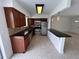 Kitchen with stainless steel appliances, granite counters, and tile backsplash at 6081 22Nd N Ave, St Petersburg, FL 33710