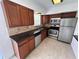 Kitchen with stainless steel appliances, granite counters, and tile backsplash at 6081 22Nd N Ave, St Petersburg, FL 33710