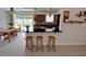 Eat-in kitchen with warm wood cabinets, a breakfast bar, and stainless steel appliances at 6081 22Nd N Ave, St Petersburg, FL 33710