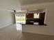 Living room area open to the kitchen and a view of the outdoor patio at 6081 22Nd N Ave, St Petersburg, FL 33710