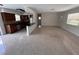 Bright living room open to the kitchen featuring terrazzo floors and neutral paint at 6081 22Nd N Ave, St Petersburg, FL 33710