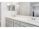 Bright bathroom featuring double sinks and a large mirror at 6226 165Th E Dr, Parrish, FL 34219