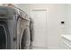 Laundry room featuring modern washer and dryer units at 6226 165Th E Dr, Parrish, FL 34219