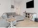 Cozy living room with comfortable seating, light wood floors, and stylish decor at 6226 165Th E Dr, Parrish, FL 34219