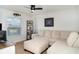 Cozy living room with comfortable seating, a ceiling fan, and a window providing natural light at 6226 165Th E Dr, Parrish, FL 34219
