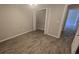 Bedroom features luxury vinyl plank flooring, a closet, neutral walls, and a ceiling fan at 6517 Summer Cove Dr, Riverview, FL 33578