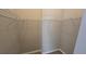 Walk-in closet with white wire shelving, providing ample storage space at 6517 Summer Cove Dr, Riverview, FL 33578