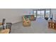 Spacious living room with comfortable sectional sofa with ocean views at 7400 Sun Island S Dr # 412, South Pasadena, FL 33707