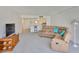 Living room featuring a large sectional sofa and an open floor plan, showcasing modern comfort at 7400 Sun Island S Dr # 412, South Pasadena, FL 33707