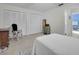 Bright bedroom features large closets and an ensuite bathroom at 7708 Fairlawn Dr, Hudson, FL 34667