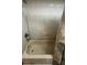 Bathtub featuring tile walls at 8718 N Brooks St, Tampa, FL 33604