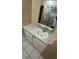 Bathroom sink and vanity cabinet at 8718 N Brooks St, Tampa, FL 33604