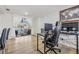 Living room with pool view, open layout, laminate flooring, and modern decor at 9115 Panda Ln, Port Richey, FL 34668