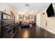 Spacious main bedroom features hardwood floors, ceiling fan, and walk-in closet at 9220 Mcintosh Rd, Dover, FL 33527