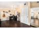 Bright office space with hardwood floors and a decorative chandelier at 9220 Mcintosh Rd, Dover, FL 33527