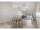 Spacious living room with neutral tile flooring, ample natural light, and modern furnishings at 9737 86Th Ave, Seminole, FL 33777