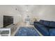 Inviting living room with tile flooring and contemporary furnishings and decor at 9737 86Th Ave, Seminole, FL 33777
