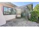 Charming outdoor patio with stone pavers and access to a screened-in sunroom at 9737 86Th Ave, Seminole, FL 33777