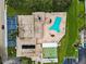 A bird's eye view showing the layout of the property, highlighting its pool and shuffleboard court at 9945 47Th N Ave # 210, St Petersburg, FL 33708