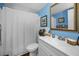 Bathroom featuring a toilet with a white shower curtain and a vanity at 9945 47Th N Ave # 210, St Petersburg, FL 33708