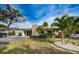 Well-maintained building exterior with lush landscaping at 9945 47Th N Ave # 210, St Petersburg, FL 33708