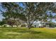 The well maintained exterior of the property with a sprawling lawn offers curb appeal and a welcoming environment at 9945 47Th N Ave # 210, St Petersburg, FL 33708
