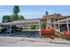 Well-maintained condo featuring covered parking, vibrant landscaping, and a welcoming atmosphere at 9945 47Th N Ave # 210, St Petersburg, FL 33708
