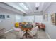 A game room with a poker table, chairs, and plenty of space at 9945 47Th N Ave # 210, St Petersburg, FL 33708
