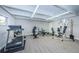 A community gym space featuring a treadmill, weights, and other exercise equipment at 9945 47Th N Ave # 210, St Petersburg, FL 33708