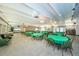 Spacious meeting room with green tablecloths at 9945 47Th N Ave # 210, St Petersburg, FL 33708