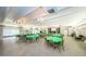 Spacious meeting room with green tablecloths at 9945 47Th N Ave # 210, St Petersburg, FL 33708