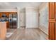 Open kitchen leading to dining area, with stainless steel appliances and ample storage at 10232 Buncombe Way, San Antonio, FL 33576